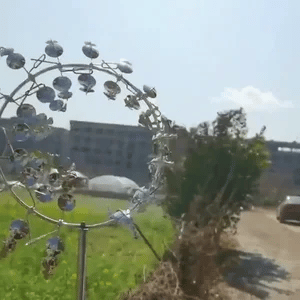 SpinGlo™ Molino de Viento Mágico -
